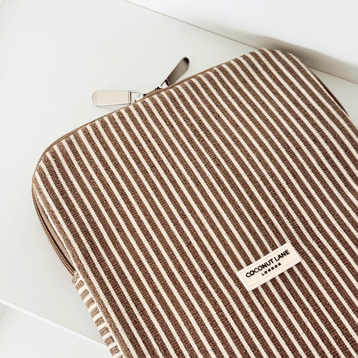 Chestnut-striped iPad sleeve with padding, zipper, and Coconut Lane label on a white background.
