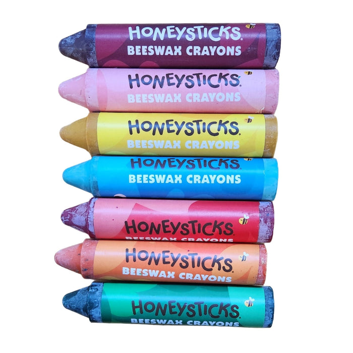 Honeysticks beeswax crayons on a white background