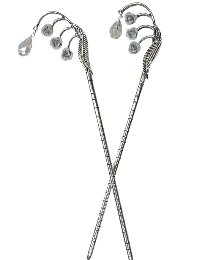 Silver Feather Hair Sticks featuring a feather design with white crystal drops, pair shown front view on a white background.