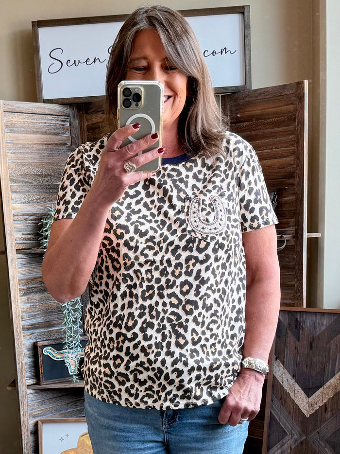 Leopard print T-shirt with beaded horseshoe emblem on chest