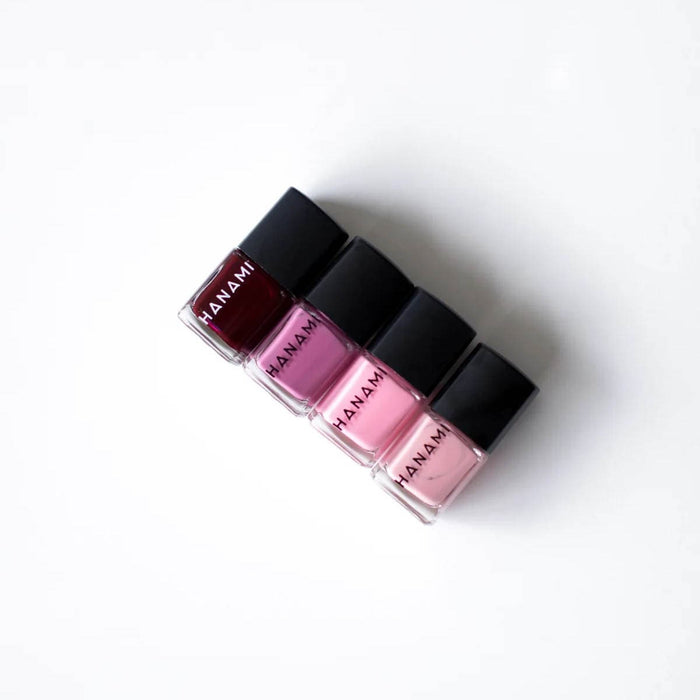 Four lip gloss bottles with 'HANAMI' branding on a white background