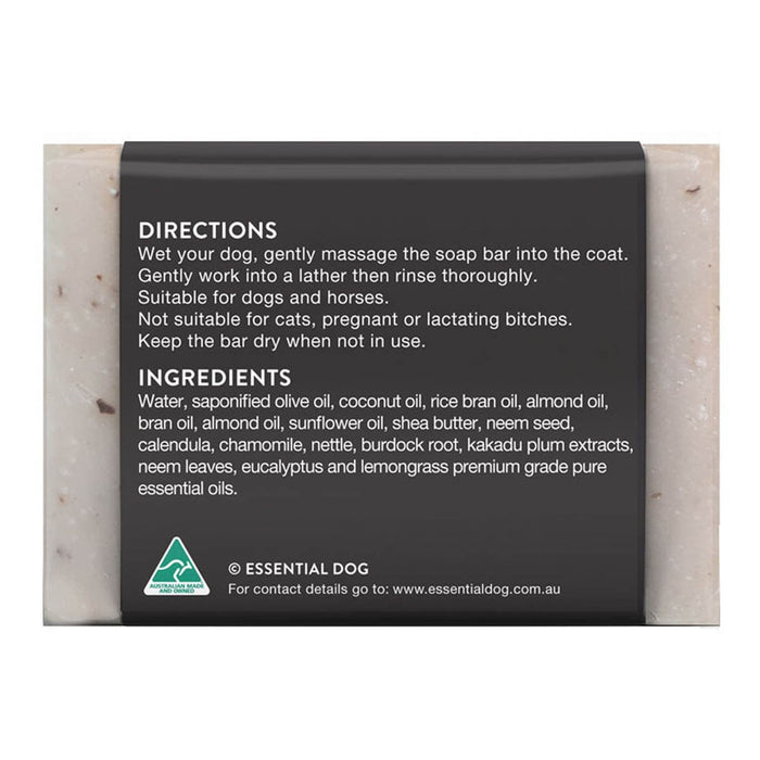 Dog soap bar with label on a white background.