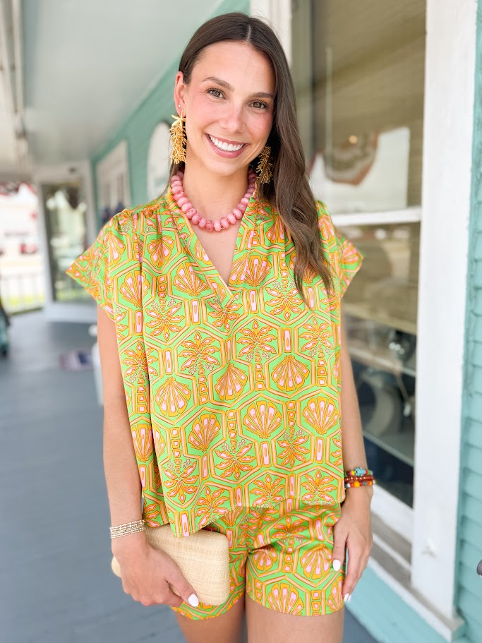 green short set ith palm tree