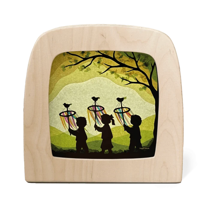 3 children carrying decorative palmpaasstokken