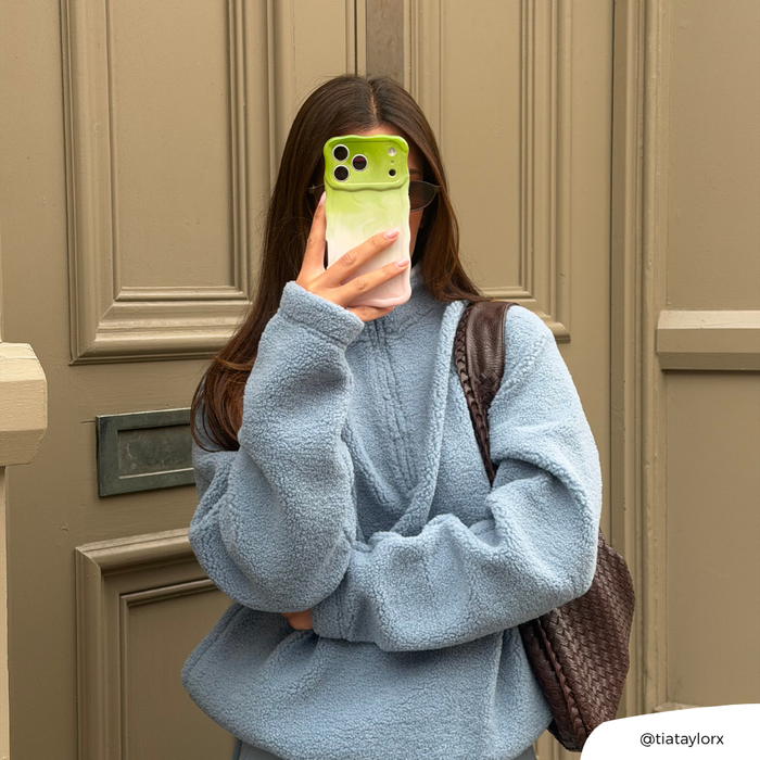 Girl taking selfie with her Wavy Phone Case in Strawberry Matcha
