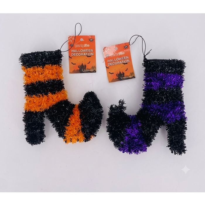 Two fuzzy Halloween stockings shaped like letters M and N, with one stocking in black and orange stripes and the other in black and purple stripes, both with orange 'Halloween Decoration' tags on a white background.