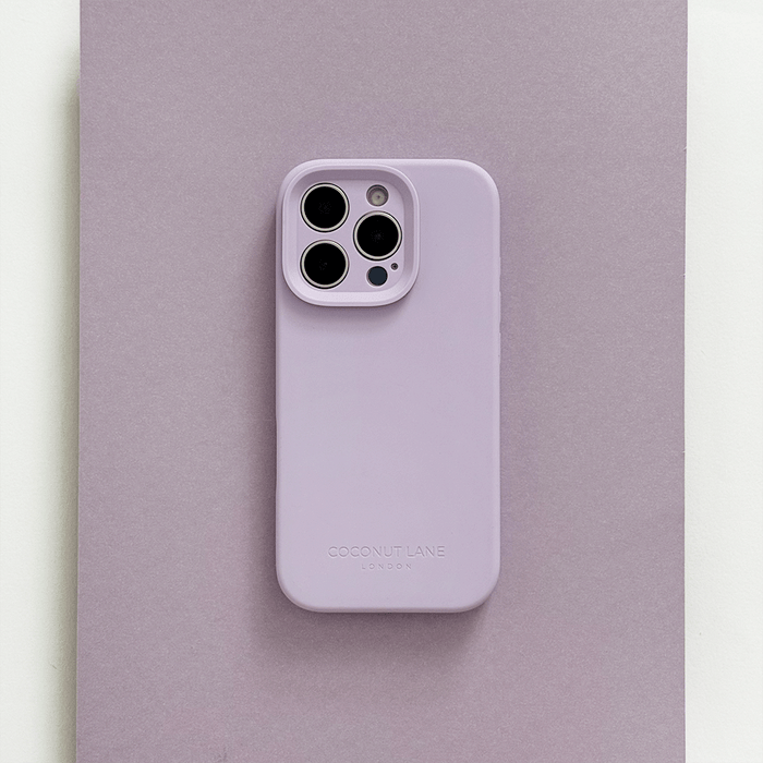 Lilac Phone Case with 'Coconut Lane' branding on a pink background.