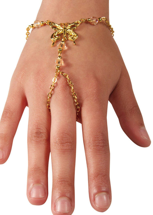 Gold butterfly hand chain finger bracelet with pink bead accents worn on hand