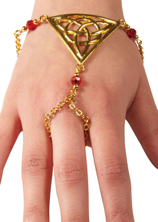 Gold Celtic triquetra triangle hand chain finger bracelet with red bead accents worn on hand