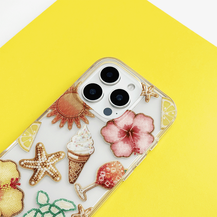 Clear phone case with colorful patch designs, shown against a yellow background.