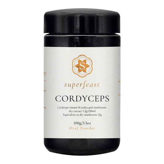 Superfeast Cordyceps oral powder container with black lid and white label on a white background