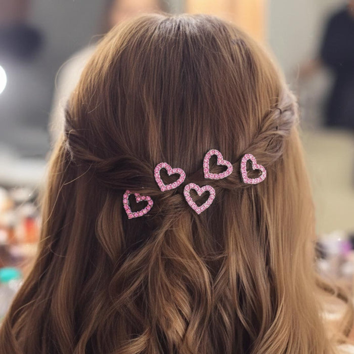 Heart crystal-studded metal U pin adding a subtle sparkle and romantic touch to any hairstyle