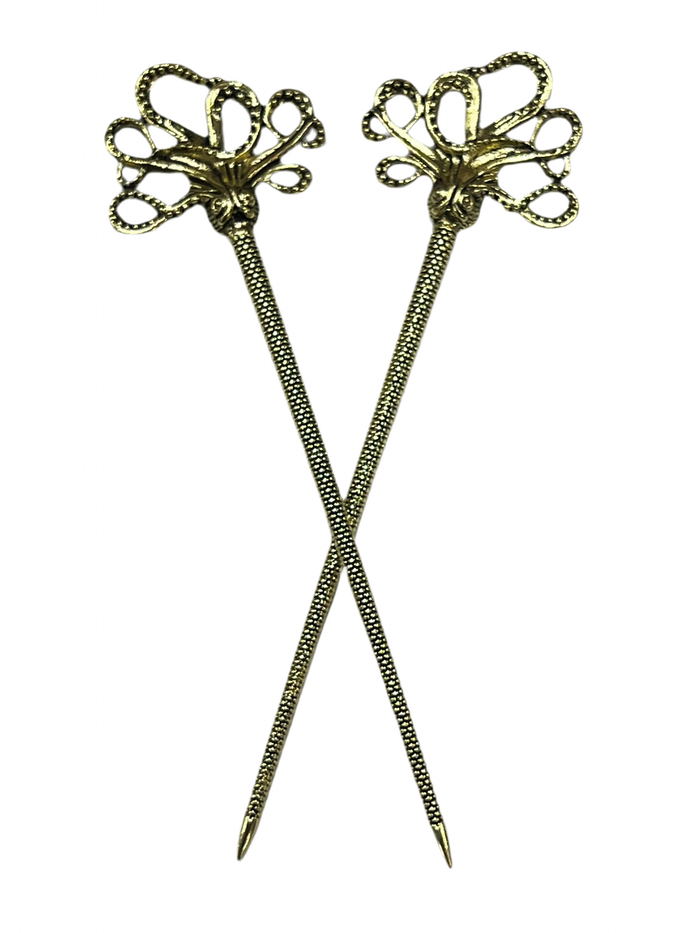 Front view of Cthulhu Hair Sticks with mystical octopus design, available in silver or gold finish.