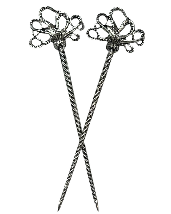 Front view of silver Cthulhu Hair Sticks featuring a mystical octopus design, decorative metal hair sticks for buns, updos, and twisted hairstyles.