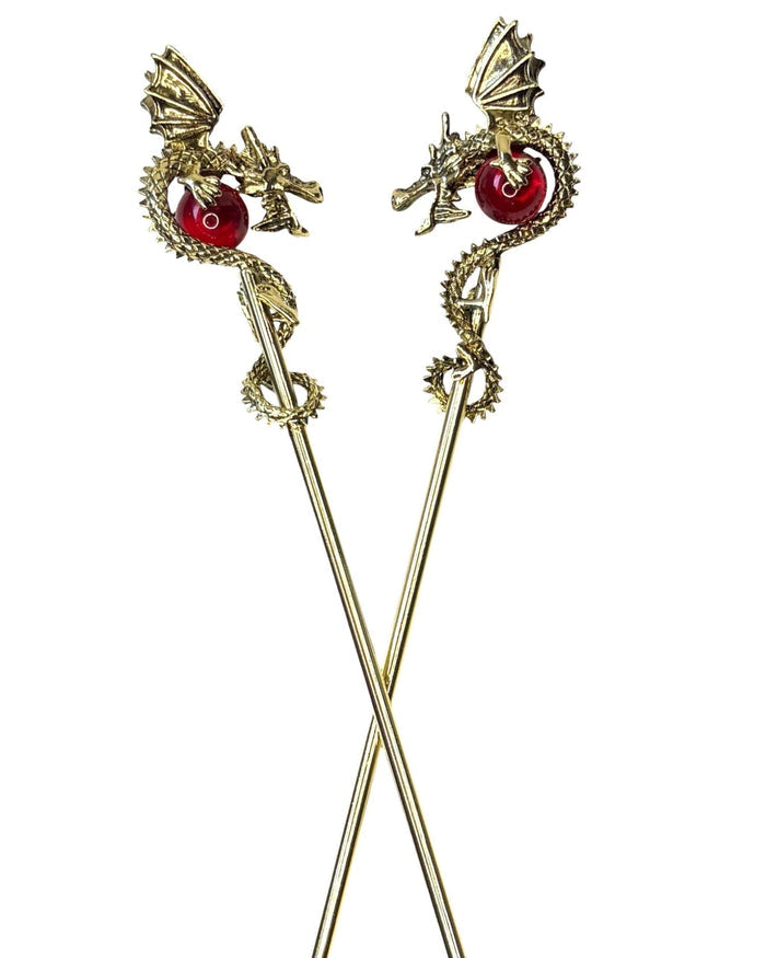Gold Dragon Hair Sticks featuring 3D dragons holding red crystal spheres, fantasy hair accessories, front view on white background.