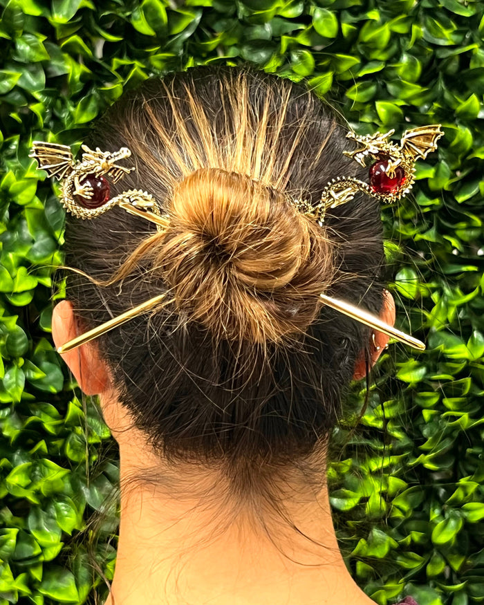 Gold Dragon Hair Sticks featuring 3D dragons holding red crystal spheres, fantasy hair accessories, front view on white background.