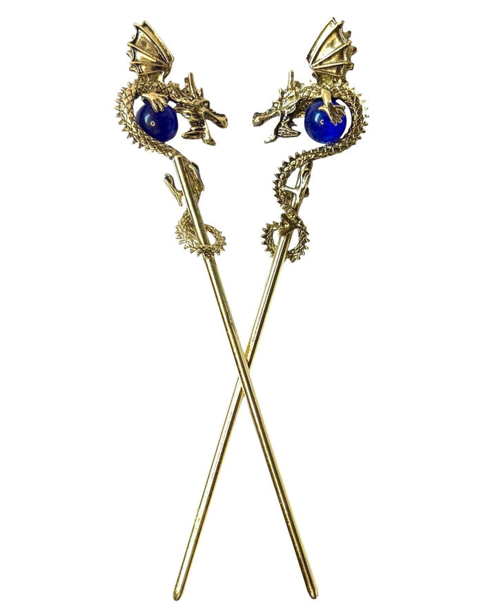Gold Dragon Hair Sticks featuring 3D dragons holding blue crystal spheres, fantasy hair accessories, front view on white background.