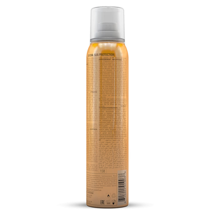 Back of the GK Hair Dry Oil Shine Spray gold can with UV/UVA Sun Protection heading, multilingual warnings, ingredients and barcode
