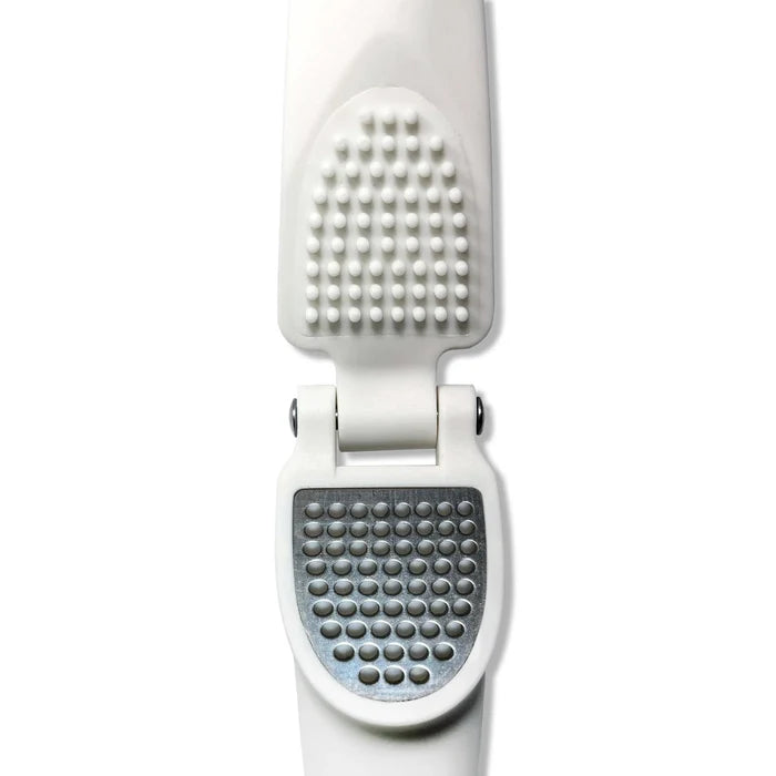 Close up of white Eco-Dough press on a white background