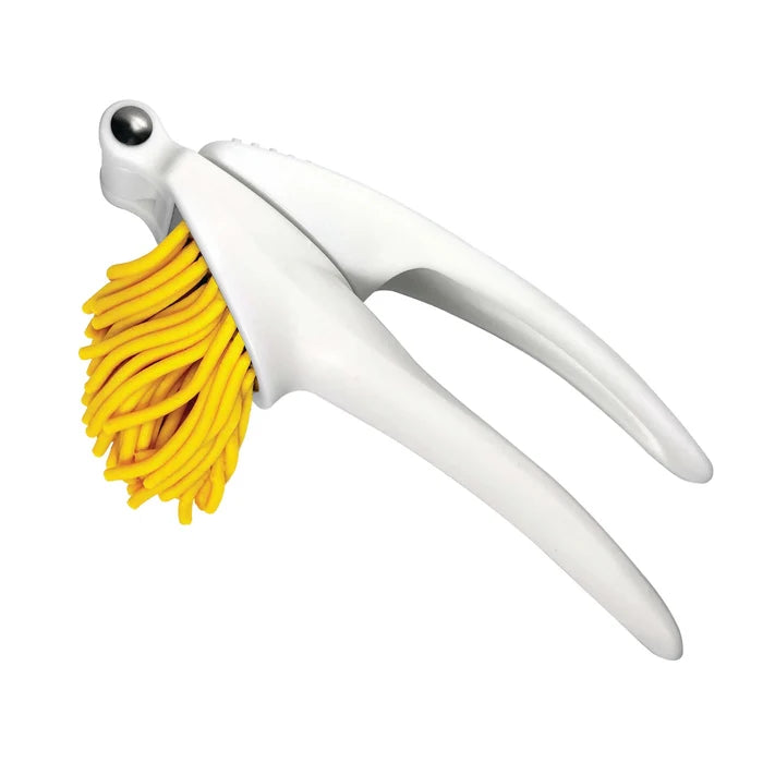White eco-dough press with strings of yellow eco-dough on a white background