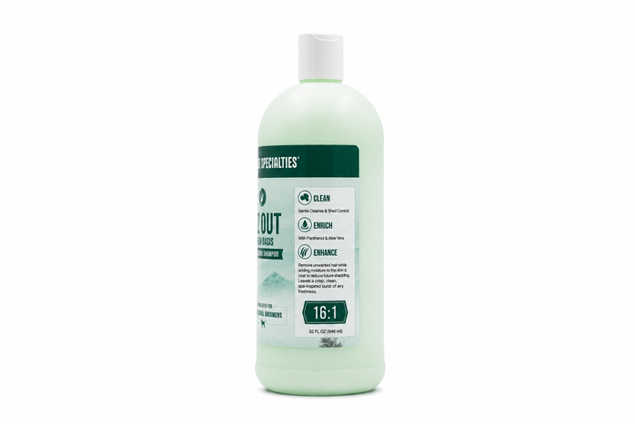 A bottle of Nature's Specialties Ez Out Fresh Oasis Deshedding Shampoo on a solid white background.