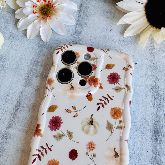 Fall Floral Bliss Wavy Luxe MagSafe Case for iPhone â The hand-illustrated watercolor design features iconic fall elementsâburgundy mums, golden oak leaves, tiny pumpkins, delicate acorns, and warm...