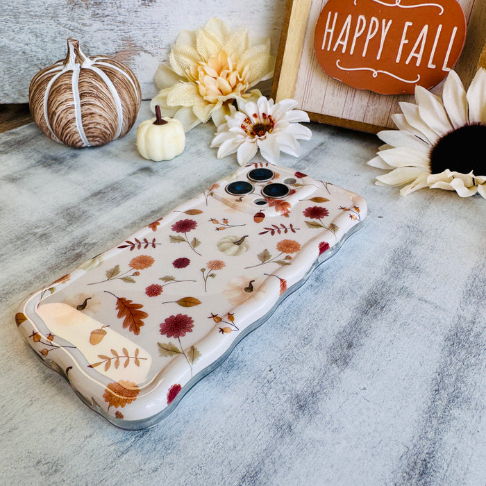 Fall Floral Bliss Wavy Luxe MagSafe Case for iPhone â The hand-illustrated watercolor design features iconic fall elementsâburgundy mums, golden oak leaves, tiny pumpkins, delicate acorns, and warm...