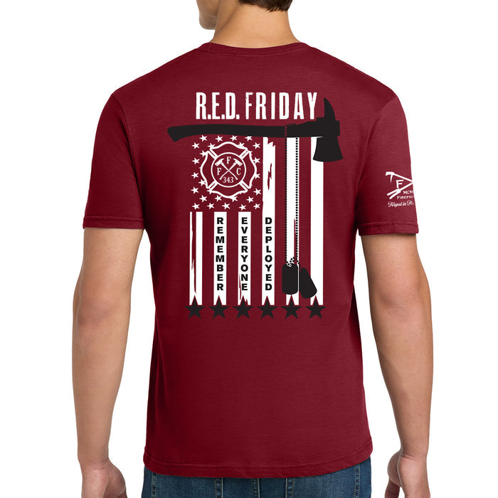 A man wearing a maroon short-sleeve t-shirt, viewed from the back. The shirt features a large graphic print with the RED Friday Firefighter graphic tee