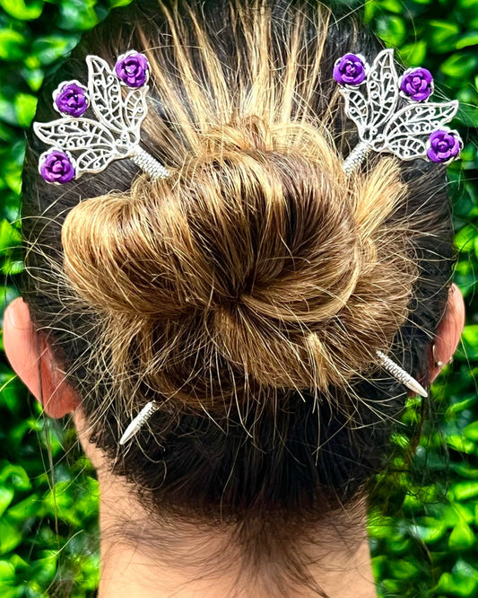 Model wearing Floral Fan Hair Sticks – Delicate flower hair accessories styled in a bun with silver floral fan hair sticks featuring purple rose accents.