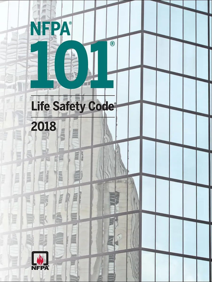 2018 edition NFPA 101 Life Safety Code book cover with green text and city building reflection in windows