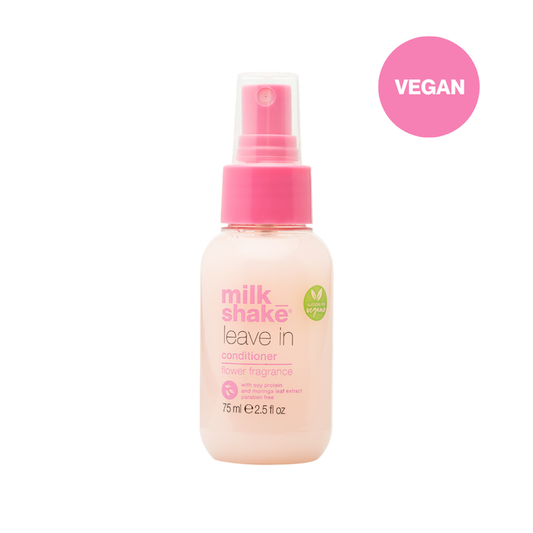 milk_shake leave-in conditioner bottle with pink spray top on a white background