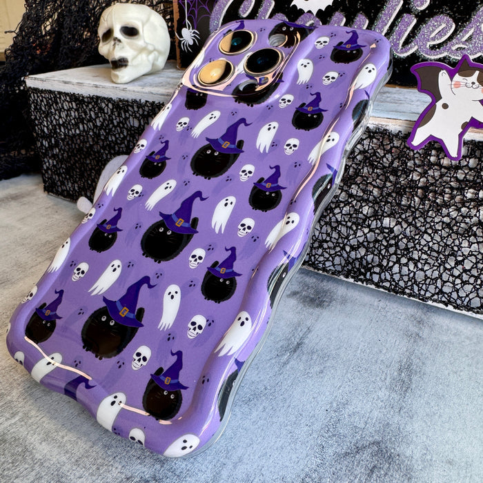 Ghostly Whisker's Wavy Luxe MagSafe iPhone case tilted on stone to show the full lavender print and glossy finish across the back.