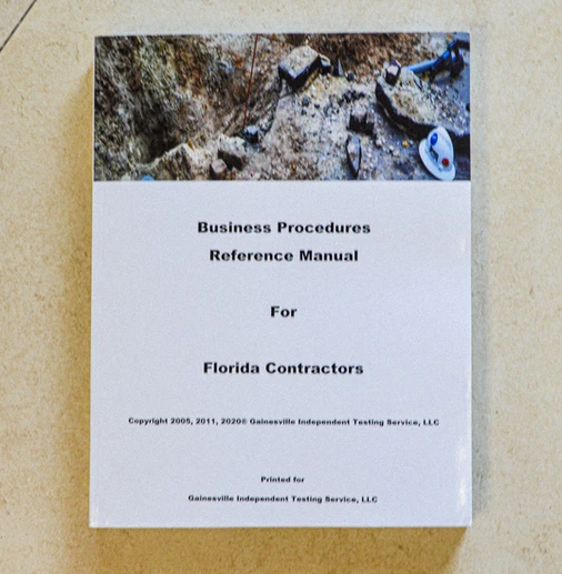 Cover of Business Procedures Reference Manual for Florida Contractors showing construction site with safety helmet and tools