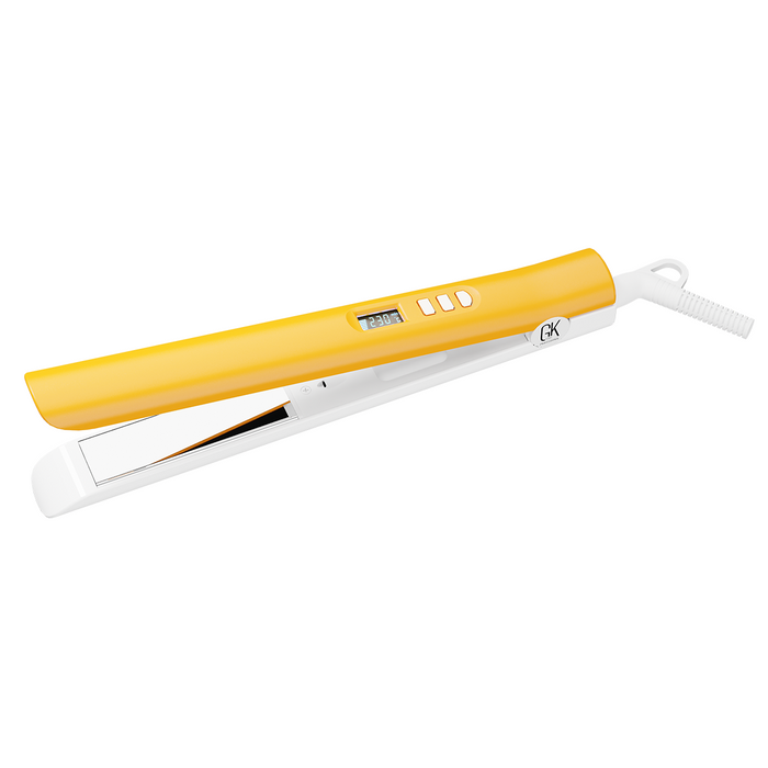 GK Hair D600+ Titanium Flat Iron in yellow and white, plates open at an angle, digital display reading 230°C