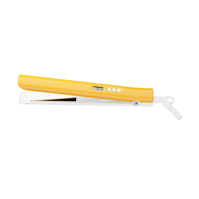 GK Hair D600+ Titanium Flat Iron from the side, plates slightly parted, screen showing 230°C, coiled white cord