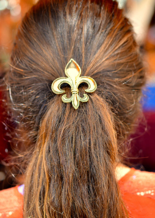 Model wearing Gold Fleur-de-lis Hair Hook - Elegant Ponytail Holder