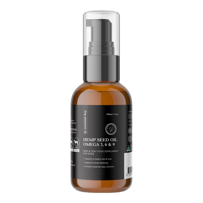 Bottle of hemp seed oil for dogs on a white background.