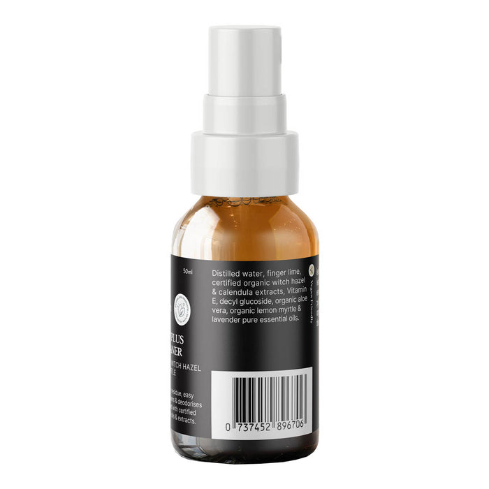 Bottle of facial toner with a white spray nozzle on a white background.