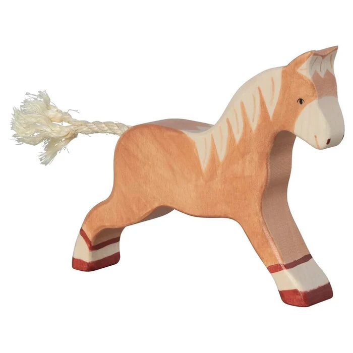 Wooden horse toy with a white mane on a white background