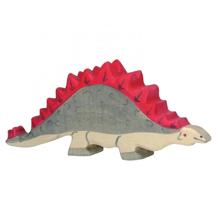 Wooden toy stegosaurus dinosaur with red spikes on a white background