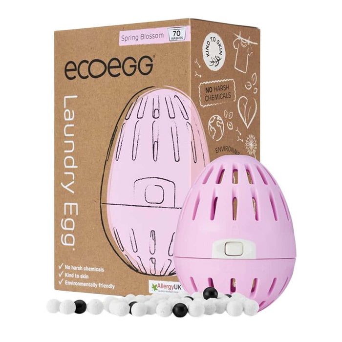 ecoegg laundry egg in pink - spring blossom fragrance. Egg and pellets next to packaging on a white background.