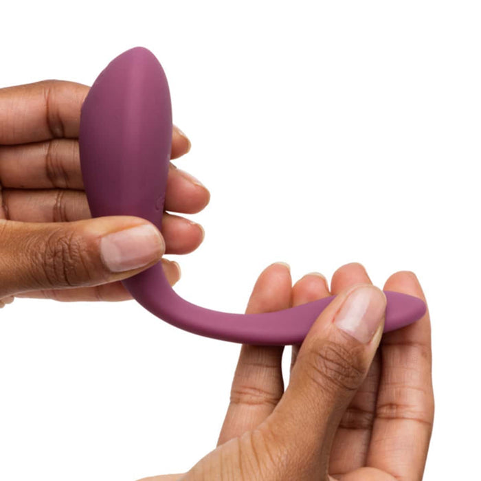 Adjustable silicone wearable couple's massager.