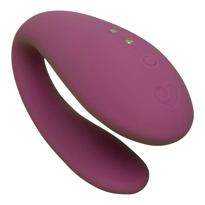 Purple silicone wearable couple's massager, with buttons on top for different vibration settings.
