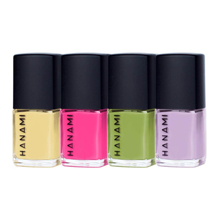 Four bottles of Hanami nail polish in yellow, pink, green and purple shades on a white background.