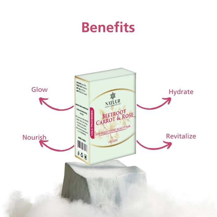 Natuur.in Beetroot Carrot and Rose skin brightening beauty bar soap in white packaging on a stone pedestal.