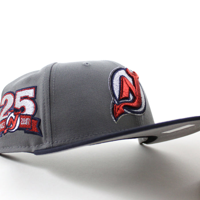 New Jersey Devils 25 Years New Era 59Fifty Fitted Hat (Storm Gray Navy Gray Under Brim)