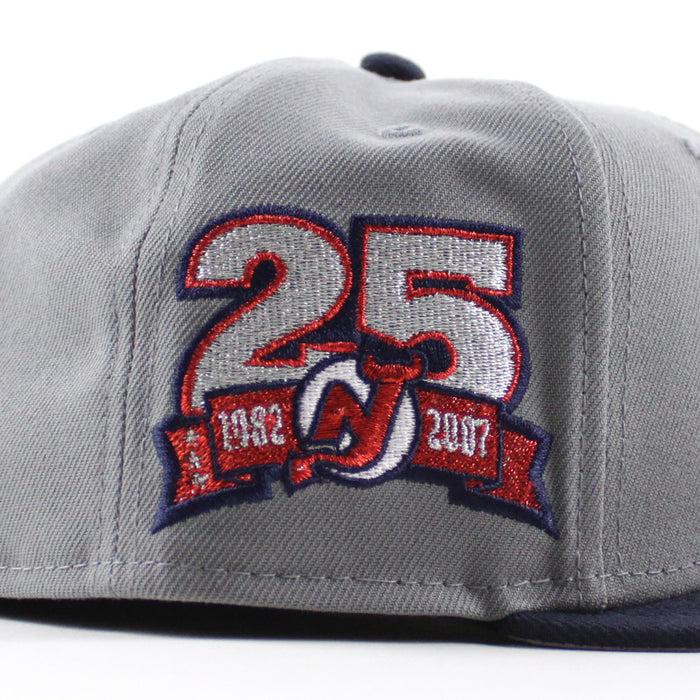 New Jersey Devils 25 Years New Era 59Fifty Fitted Hat (Storm Gray Navy Gray Under Brim)