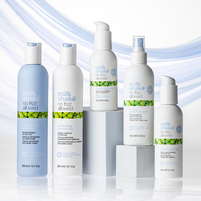 Set of milk_shake no frizz allowed hair care products on a light blue gradient background