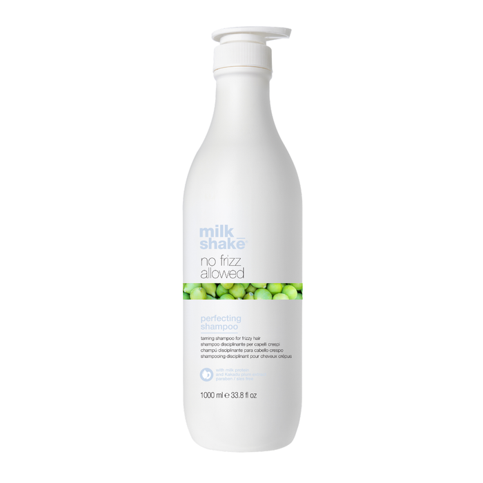 milk_shake no frizz allowed shampoo bottle with green label on a white background
