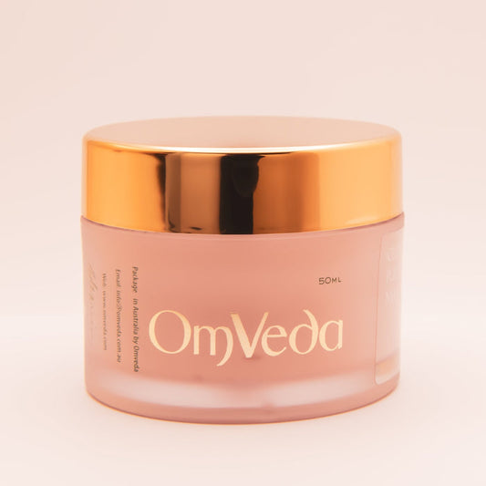 OmVeda Clove Purifying Mask jar front view, gold lid and pale pink body, 50 ml